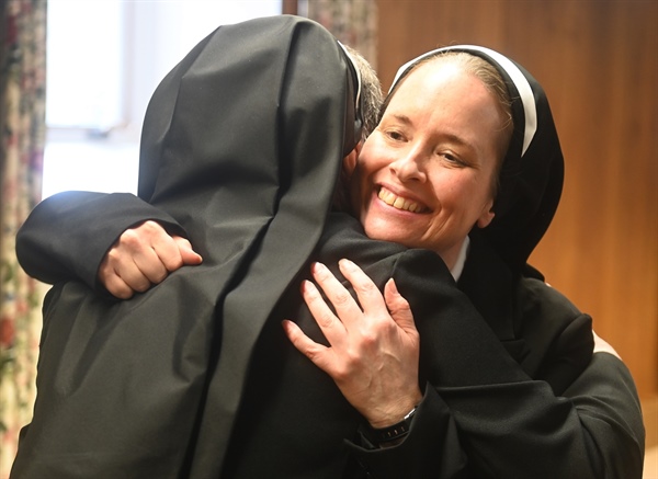 Sister Catherine Peter Logan makes first profession of vows as Franciscan sister